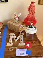 Group shot showing all six items together for scale and condition
