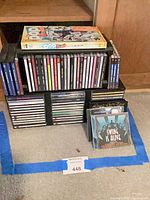 Overall lot with CD rack, Pop Parade box set on top, Swing Is Alive compilation at front