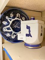 Jar and plate together on shelf, showing overall design and color