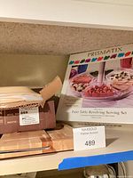 Boxed Prismatix serving set, partial view of other items