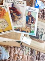 Stack of assorted vintage magazine issues and pages
