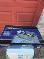 Retail box showing Char-Broil Commercial Series Patio Kitchen condiment bin kit