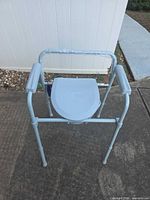 Full view of commode with seat closed