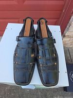 Top view of the pair of Stacy Adams black fisherman sandals showing overall style and condition