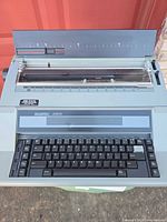 Front angled view showing full Swintec 2600 typewriter and keyboard