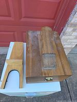 Shoe shine box and boot jack together showing overall condition and size