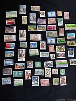 All stamps laid out on black background