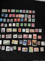 Full layout showing majority of 80 assorted stamps