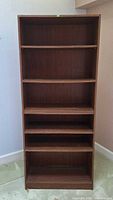 front view of entire bookcase showing five shelves