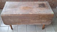 Table with leaves down showing narrow profile and legs