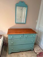 Dresser and mirror together for scale and style