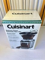 Front view of sealed Cuisinart DBM-8 grinder box