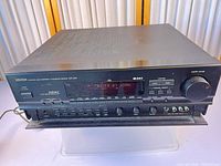 Front and top view of Denon AVR-2500 receiver showing overall condition and attached power cord