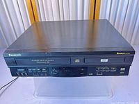 Front view of Panasonic PV-D4732 combo showing branding and connection panel