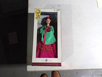 Front view of sealed Barbie box showing doll and 25th Anniversary label