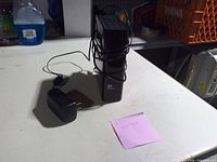 Drive front view showing WD logo and included power adapter