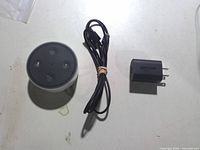 Top view of Amazon Echo Dot 2nd Gen showing control buttons