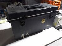 Closed black Plano toolbox with latches and handle