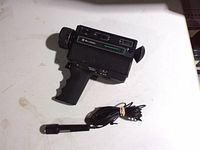 Camera and microphone laid out on table