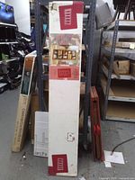 Full view of unopened tall box containing bookcase kit