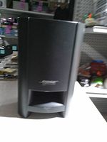 Front view of Bose subwoofer with logo and bass port