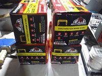 Front view of all four Rhynopac boxes showing branding and product details