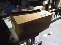 Closed cardboard box sitting on a table