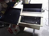 Overall view of Brother electronic typewriter with cover removed