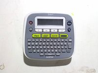 Front view showing LCD, keyboard, control buttons
