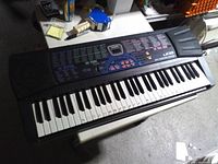 Full view of Casio LK-33 keyboard showing keys, speakers and control panel