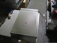 Closed view of HP ScanJet 4p on workbench