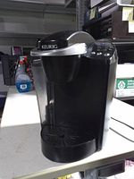 Front view of Keurig coffee maker showing overall condition
