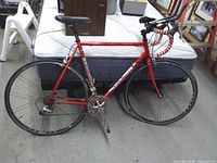 Full view of bicycle right side showing frame, handlebars, wheels