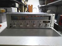 Front view showing model number, controls and meters
