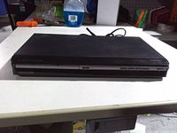 Front view showing Memorex logo, disc tray and control buttons