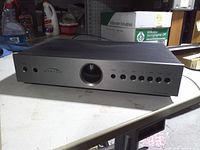 Front view of Myryad MI 120 amplifier, showing power button and control buttons
