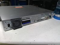 Rear of Panasonic unit showing fan, speaker terminals, power inlet