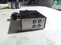 Front view showing Realistic logo, four RCA connectors and labeling