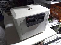 Closed SentrySafe 1170 chest showing front lock and brand badge