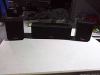 Front view of all three Pioneer speakers with grilles