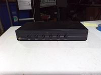 Front view showing logo and six zone buttons