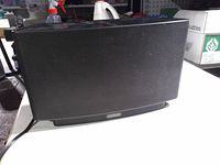 Front view showing grille and Sonos badge