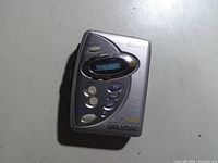Front view showing Sony logo, LCD display and TV/FM/AM buttons