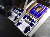 Two Aquasentials kits open showing contents and brochure