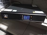 Front view showing Vertiv logo, LCD display, control buttons
