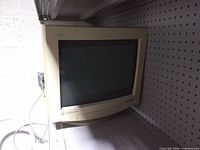 Front angled view of Gateway 2000 CRT monitor on shelf