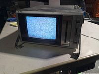 Front view showing CRT screen with static and control panel