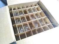 Cardboard divider tray showing multiple punch cups