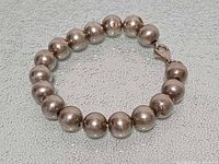 Full view of sterling bead bracelet in circular arrangement