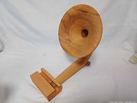 Front angled view showing horn and base